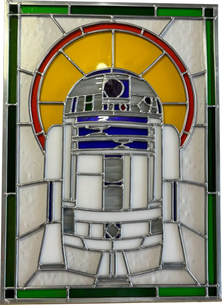 A stained glass window depicting R2-D2.